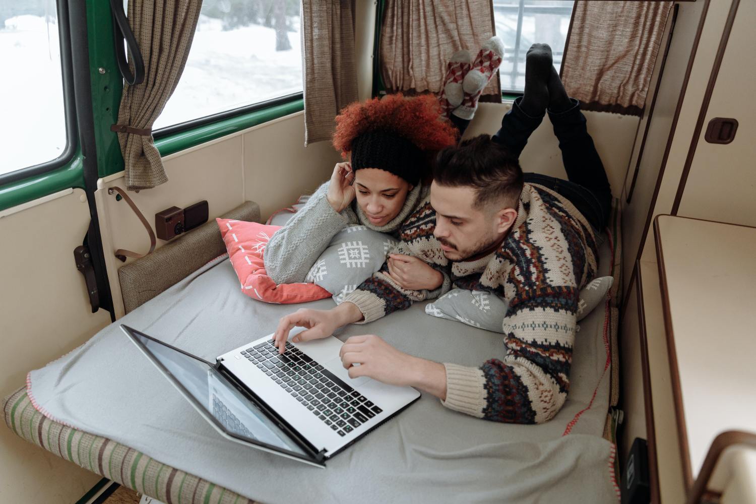 Couple researching about domicile vs residence for nomads and van lifers.